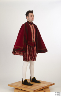 Photos Man in Historical Dress 27 a poses red cloak…